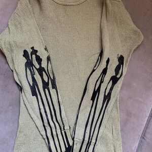 Beige Knit Top with Black Silhouette Design